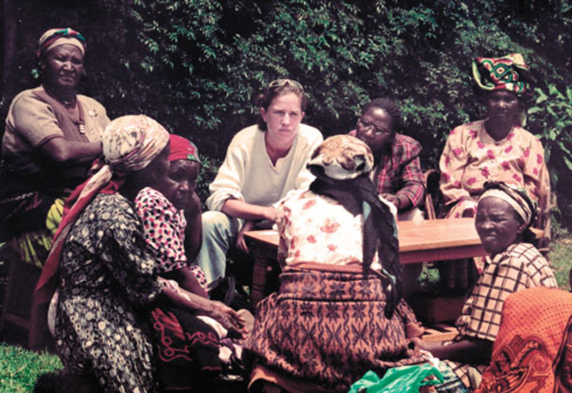 Caroline Elkins ’91, center, in Kenya in 2003 with survivors of Britain’s detention program.