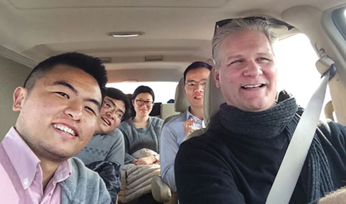 Prince-LangfittLedeRB.jpg Frank Langfitt ’86 with his NPR assistant, Yang Zhuo (left), and passengers in the “Free Loving-Heart Taxi”