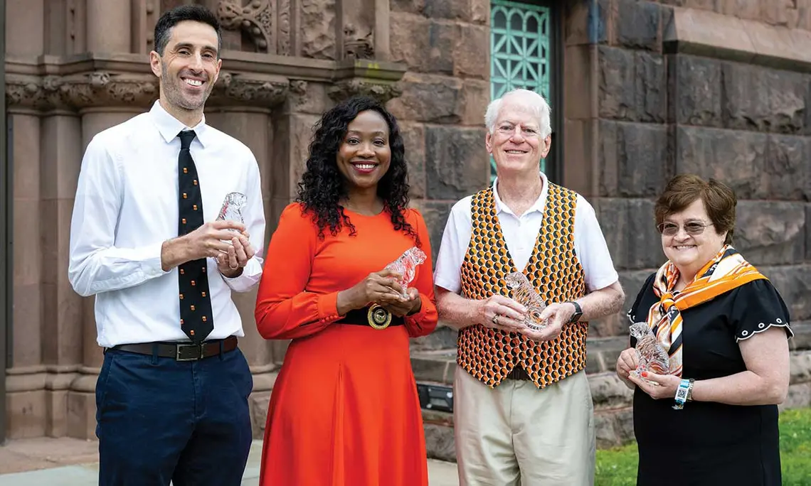 Service Award winners: Richard Just ’01, Itohowo Ekpoudom ’03, Robert Loveman ’69, and Colleen Kelly ’77 