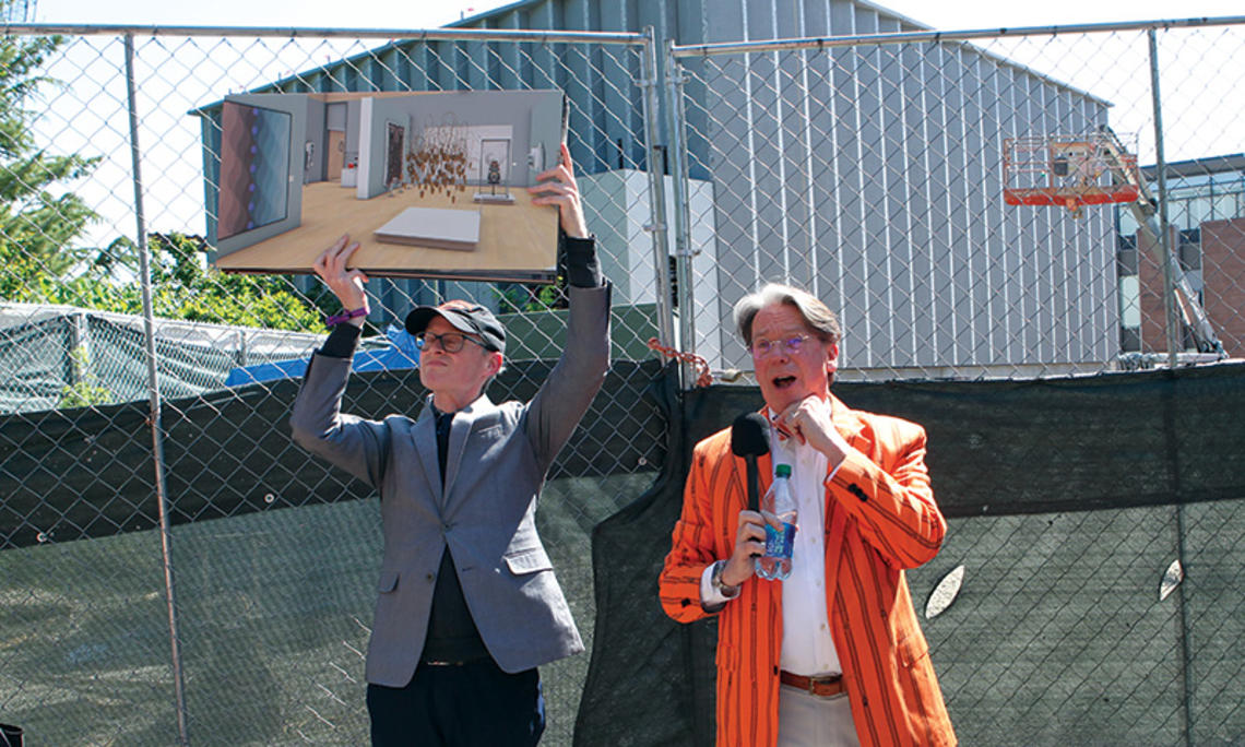 Museum director James Steward speaking outdoors