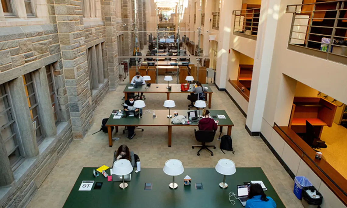 Students study in Firestone Library in 2021.