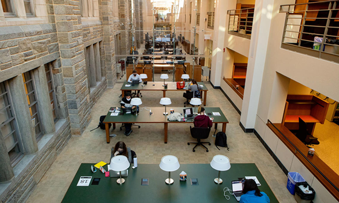 Students study in Firestone Library in 2021.