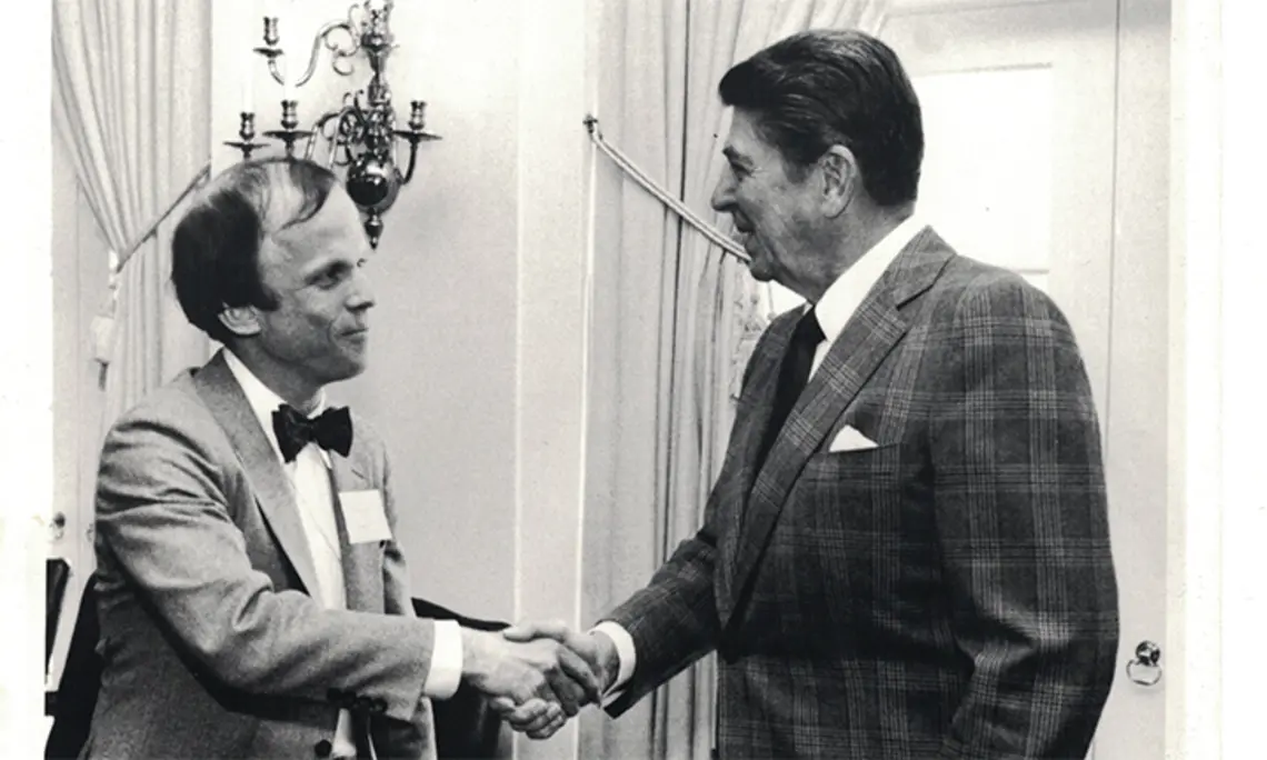 Lanny Jones ’66, left, and President Ronald Reagan at the White House on Jan. 17, 1984.