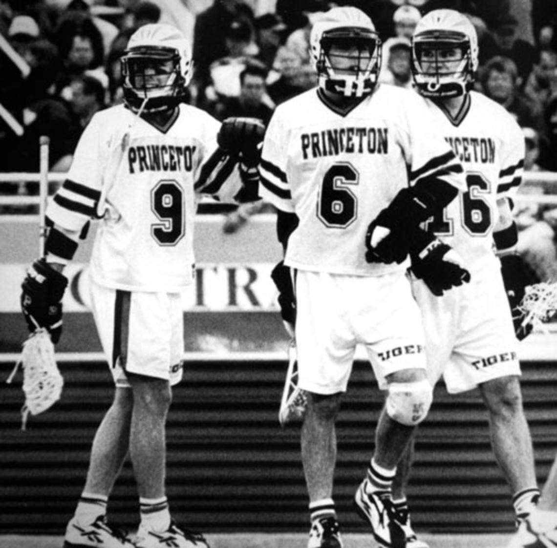 The Class of ’98’s top lacrosse attackmen — from left, Jon Hess, Chris Massey, and Jesse Hubbard (pictured here during their undergraduate days) — still play together in an over-30 division.