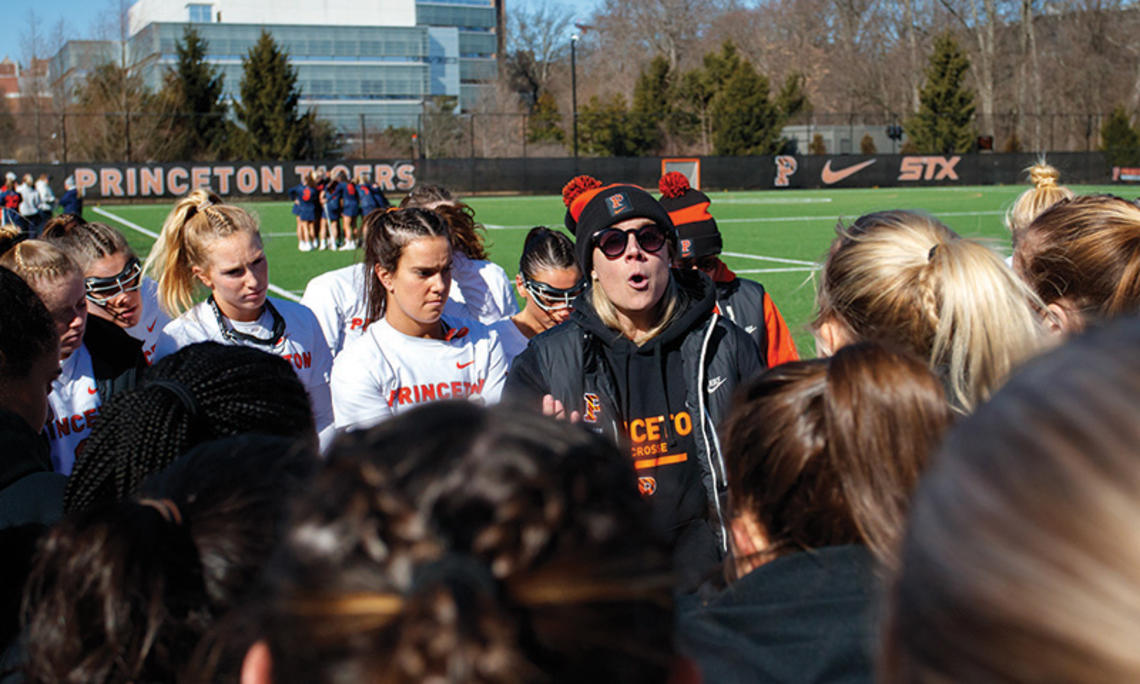 Jenn Cook speaking to her team