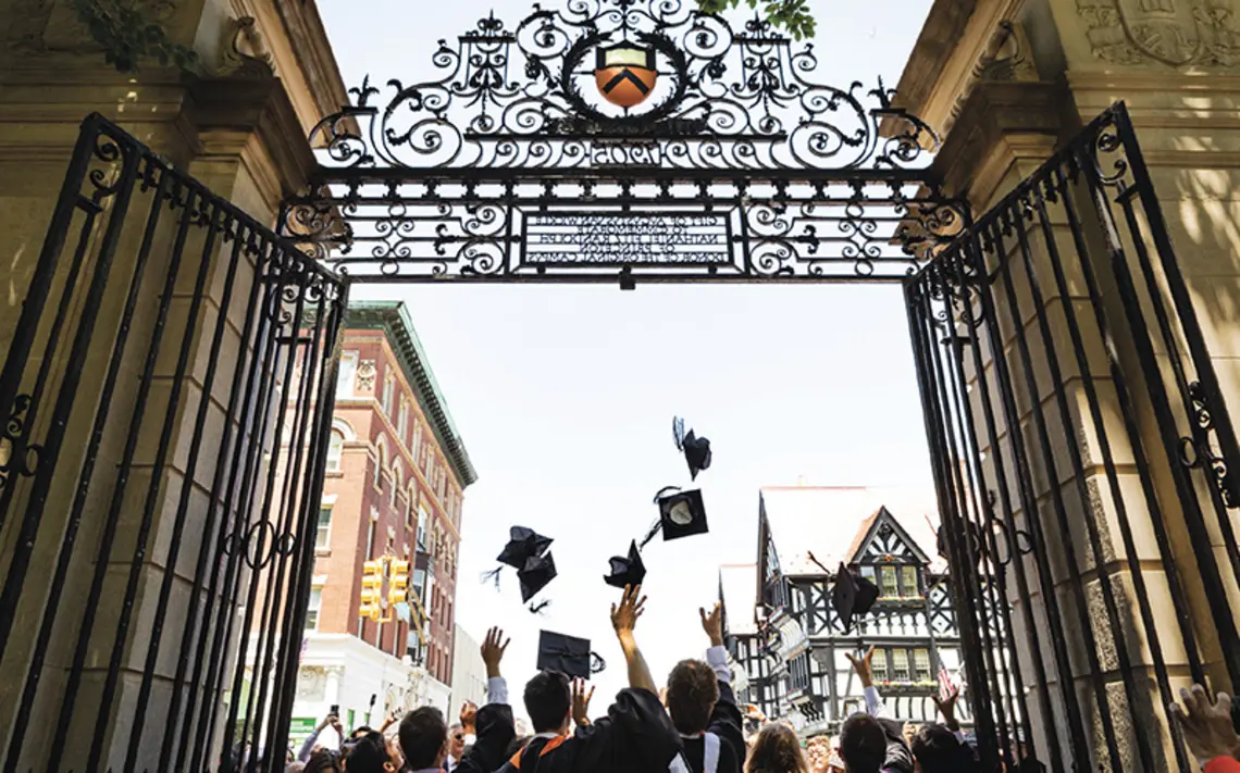 Princeton’s newest alumni make their exit through FitzRandolph Gate following Commencement.