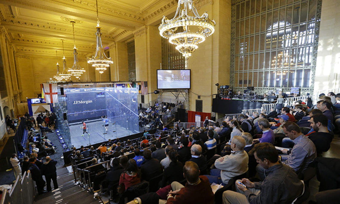 Fans watch the Tournament of Champions squash tournament at New York City’s Grand Central Terminal in January 2015. 