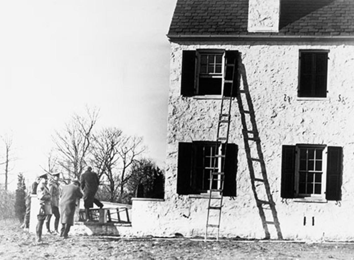 Police investigate the kidnapping of Charles Lindbergh’s son at the family home near Princeton.
