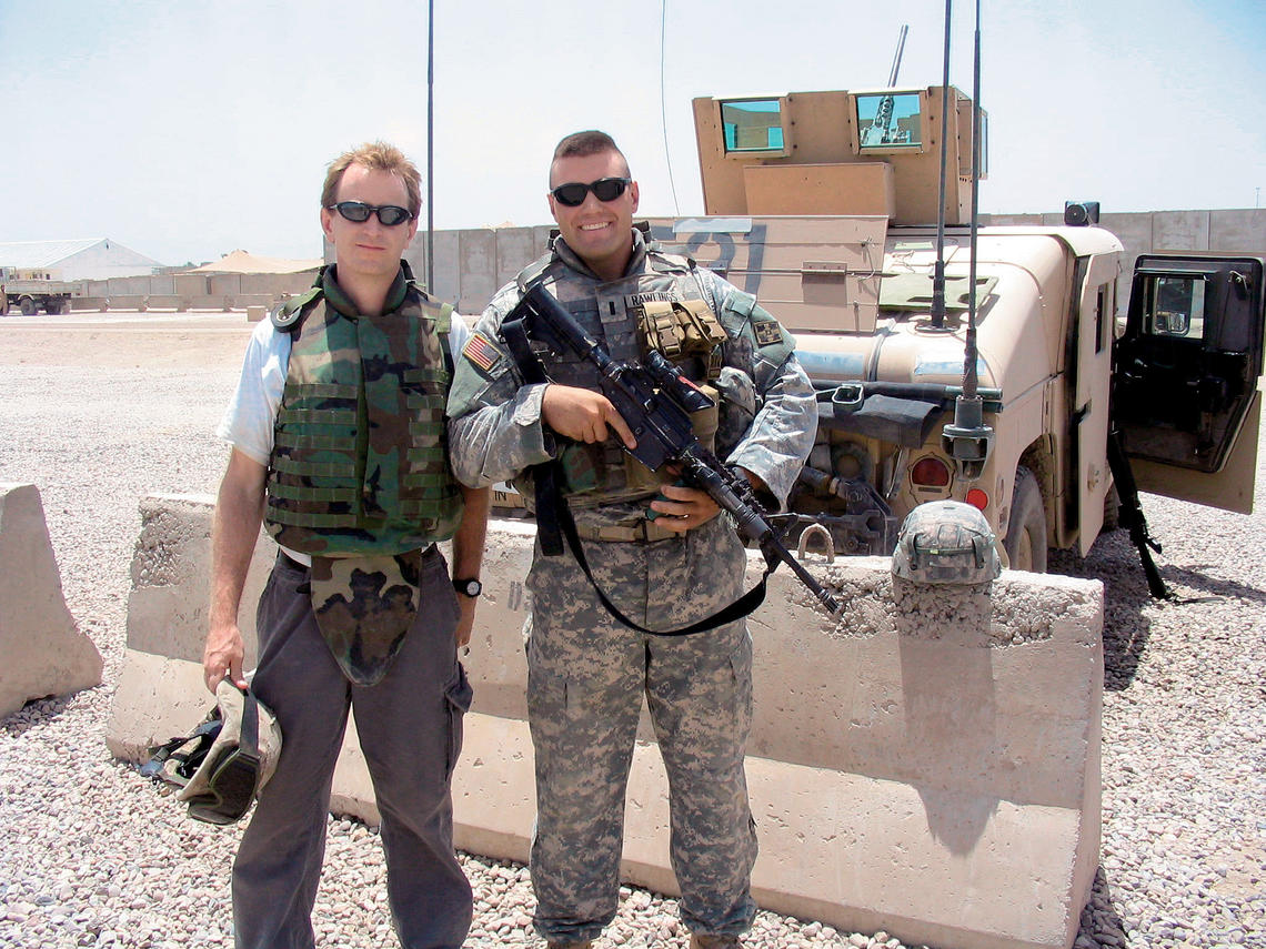Author Whitney Terrell, left, with Nate Rawlings '04 at Camp Liberty in Iraq in July 2006.