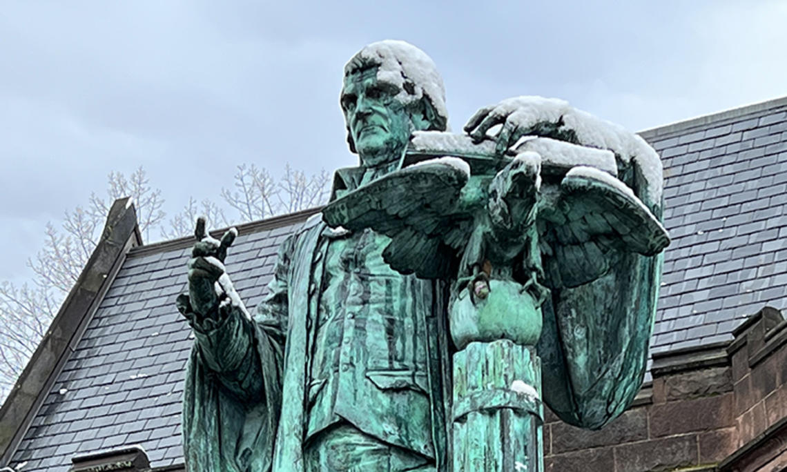 The John Witherspoon statue next to the East Pyne building on the Princeton University campus.