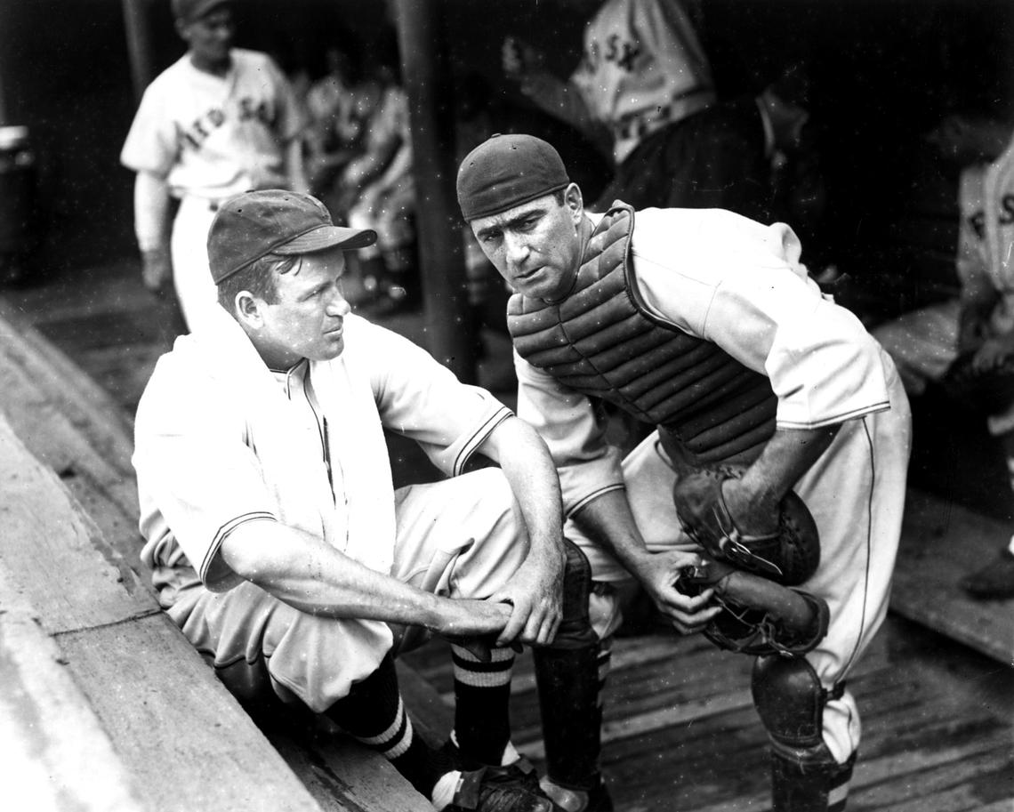 Moe Berg '23 and player-manager Joe Cronin in the Boston Red Sox dugout, circa 1937. Berg played in the major leagues for 15 seasons, mostly as a backup catcher, compiling a .243 lifetime batting average.