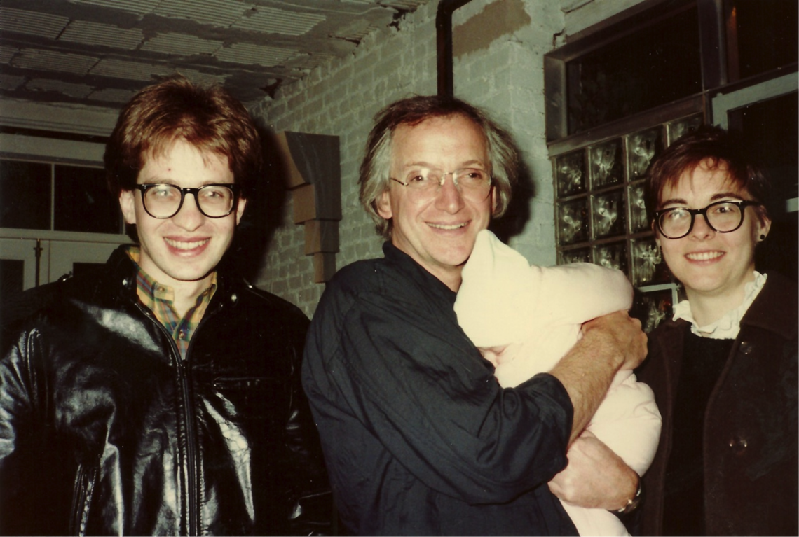 graves_kracauer.png From left, Benjamin Kracauer *79, Michael Graves, holding Emily Kracauer, and Cynthia Phifer Kracauer ’75 *79, at the Warehouse in 1982.