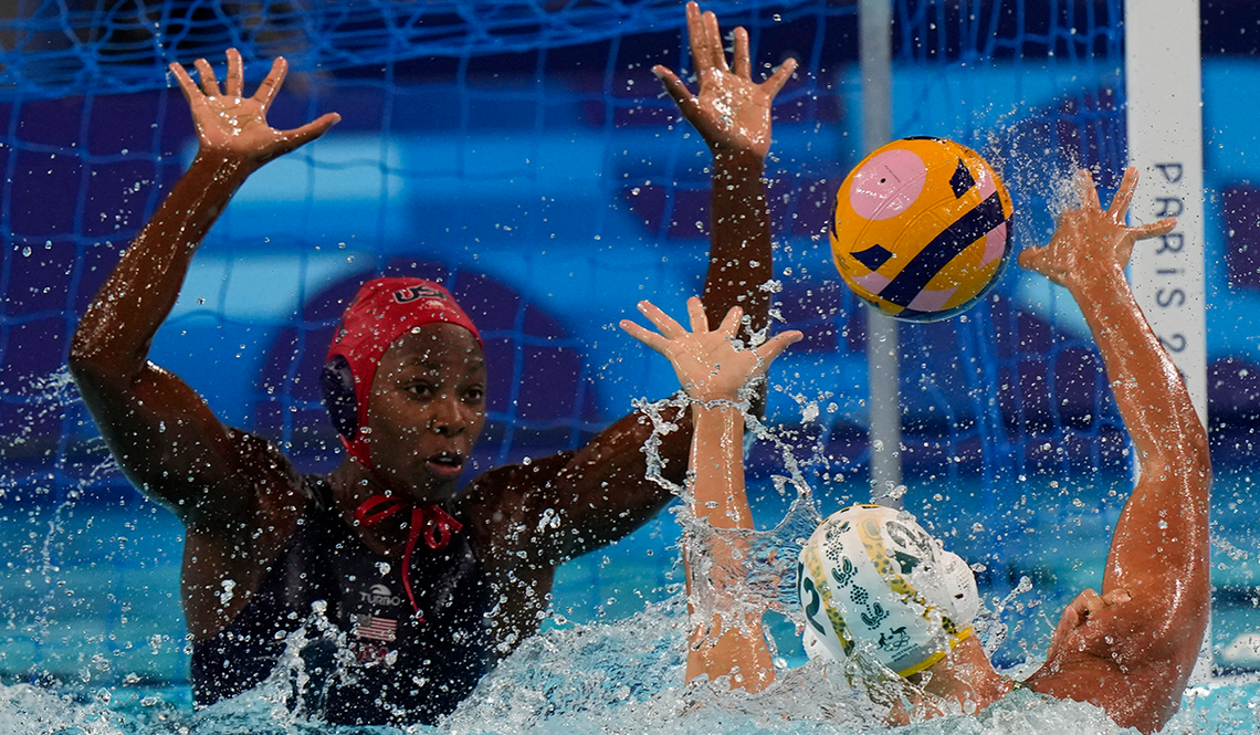 Ashleigh Johnson ’17, left, defends a shot by Australia’s Danijela Jackovich in the Olympic semifinals.