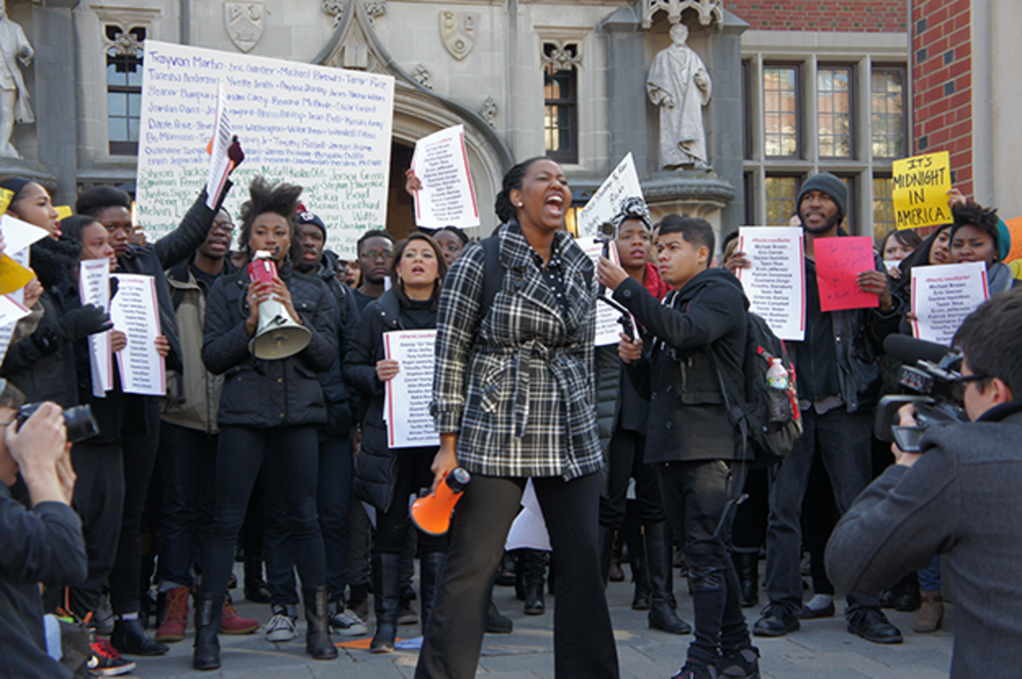 Outside Frist Campus Center, Princeton students rallied against racialized state violence. (Ellis Liang â15)