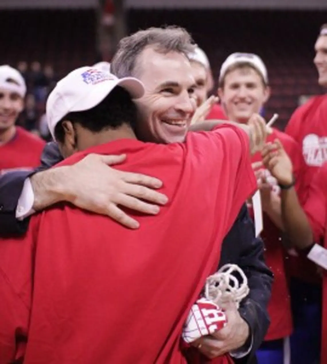 Mike Brennan â94 celebrated with his team in Boston March 12. (Courtesy American University Athletics Communications)
