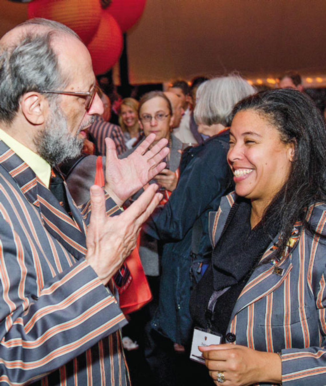 Eli Arthur Schwartz *60 and Patrice Jean *99, adorned in their Association of Princeton Graduate Alumni Reunions jackets, enjoy a conversation during the “Many Minds, Many Stripes” conference.