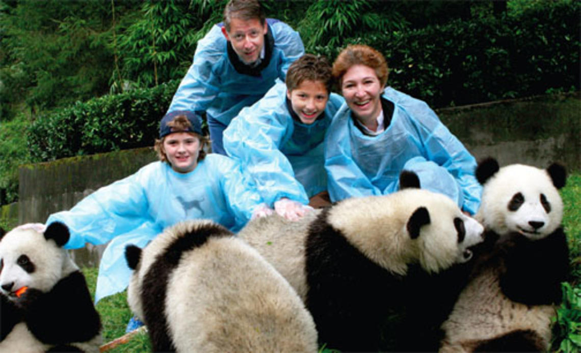 prz102208.jpg Dean Slaughter, Professor Moravcsik, and their children, Edward (left) and Alexander, at the Wolong Panda Reserve—the largest in China.