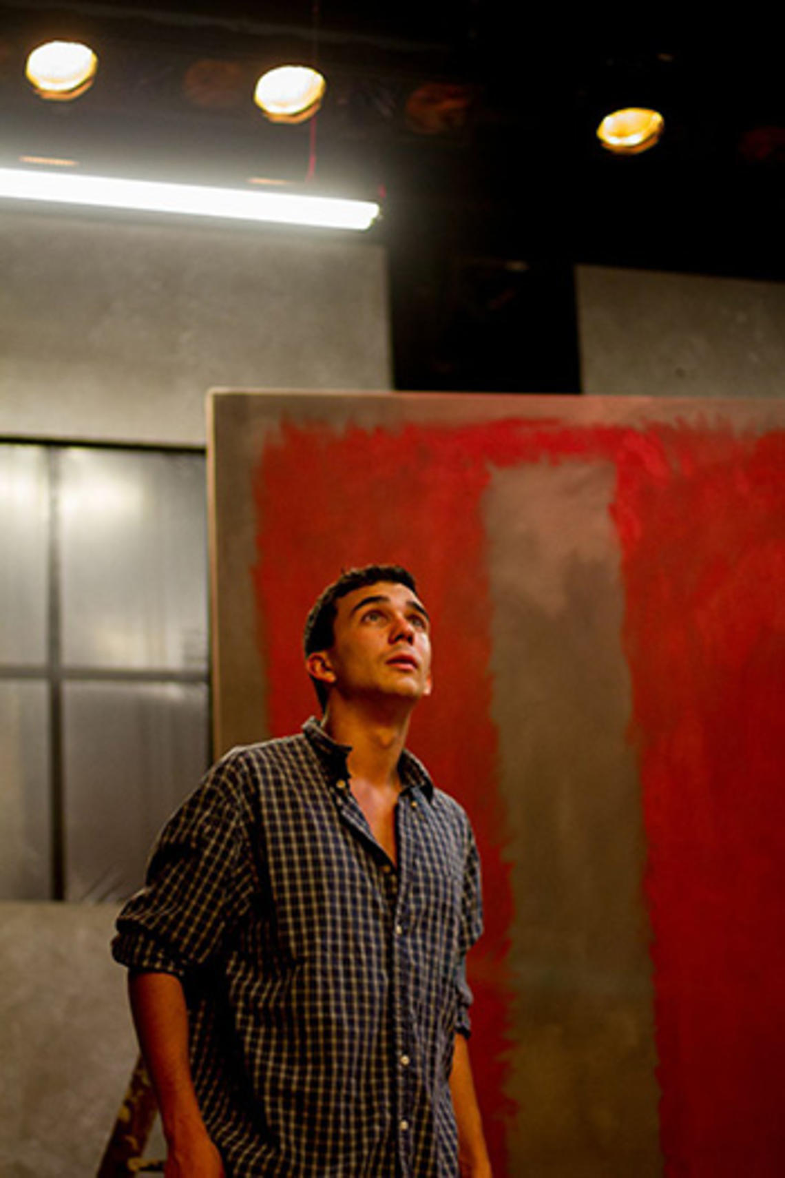 Ryan Gedrich â16 as Ken, assistant to the artist Mark Rothko, in Theatre Intime's production of Red. (Aleka Gürel â15)