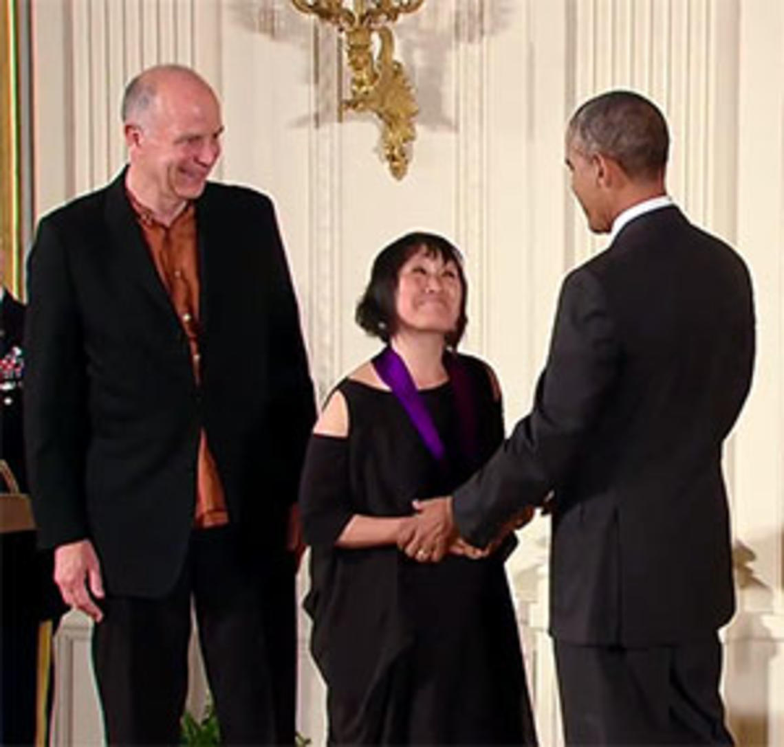 National Medal of Art recipient Tod Williams â65 *67, left, looks on as President Barack Obama congratulates Williamsâ wife and fellow honoree Billie Tsien. (WhiteHouse.gov)