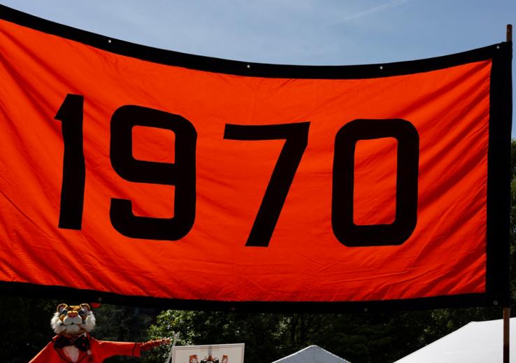An orange-and-black banner that reads "1970."