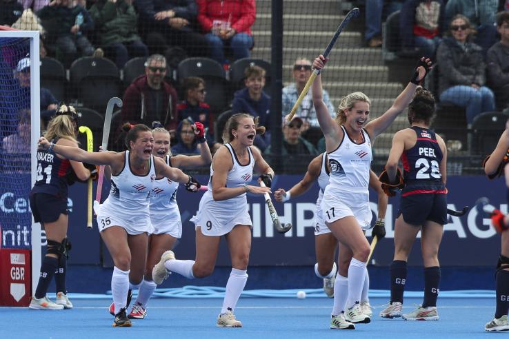 Beth Yeager ’26 (No. 17 in white) celebrates scoring a goal during the United States’ Women's FIH Hockey Pro League match against Great Britain on June 1.   