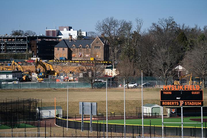 A view across Roberts Stadium of the ES & SEAS construction with the former Court Club up on wheels.
