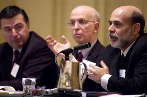 Federal Reserve Governor Ben Bernanke, right, speaks on a panel titled “Transition from Academic to Policymaker” along with Philadelphia Federal Reserve Bank President Anthony Santomero, left, and Blinder, center, in 2005. 