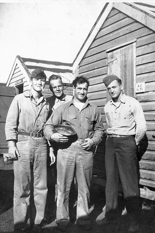  Before the invasion of Tarawa in 1943, 1st Lt. Alexander Bonnyman ’32, second from left, posed with fellow officers in New Zealand.