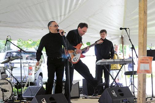 The Funstigators, from left, Ray Gonzalez ’84, Kevin Hensley ’84, and Charles Sullivan ’84, (Steve Buratowski ’84, Chuck Steidel ’84, and Mark Crimmins ’84 are not in photo), perform in the Battle of the Alumni Bands