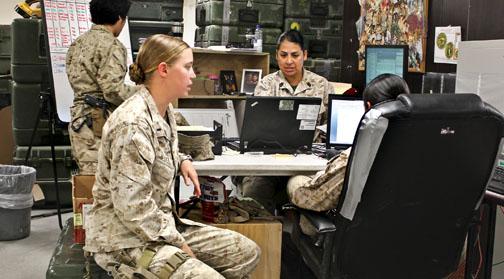  Bedell in the FET office at Camp Leatherneck, the Marines’ primary base in Helmand Province.  