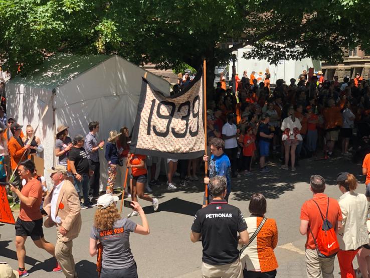 The 1939 banner is carried in the P-rade.