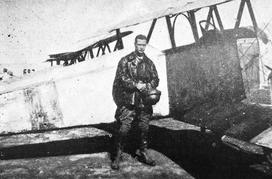 Hobey Baker as a Flight Commander in France stands by his plane. 
