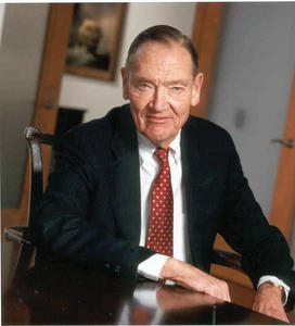Image of John Bogle ’51 sitting at a desk