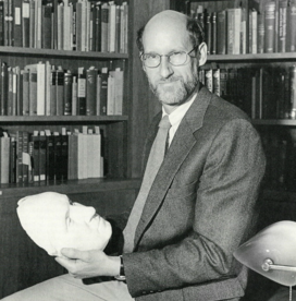 masks_bidwell.png Man holding a plaster cast of a face