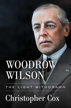 Book cover of Woodrow Wilson by Christopher Cox which is black with a picture of Wilson.