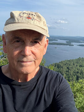 JayParis71.jpg Jay Paris ’71 in front of a lake.