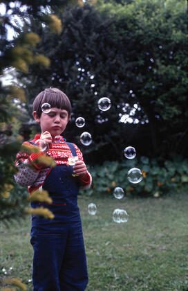 MICROBIOME_Img013_13224096 copy.jpg photo of Rob Knight as a child in New Zealand blowing bubbles