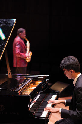 Charles Dutta &rsquo;27 on piano