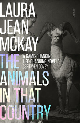 AnimalsInThatCountry.jpg A book cover with a black and white photo of a woman next to a longhorn sheep.