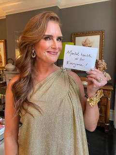 Supporting the green ribbons effort, Brooke Shields ’87 holds up a message to the Princeton community: “Mental health is for everyone!”