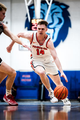 Matt Allocco drives, dribbling with his left hand