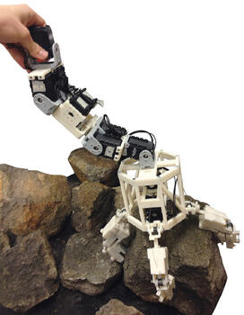 OTC-robot.jpg The parts of this model of a robot that could navigate an asteroid’s surface were created by students on a 3-D printer.