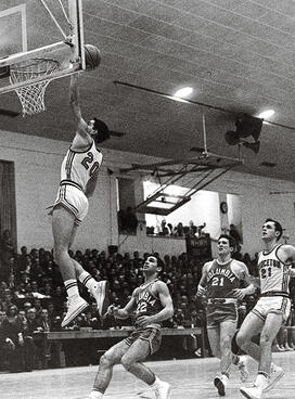 SP-PointWalters2new.jpg Walters drives to the basket at Dillon Gym.