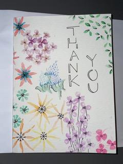 Watercolors2.jpeg A watercolor painting of flowers with text reading "Thank you."