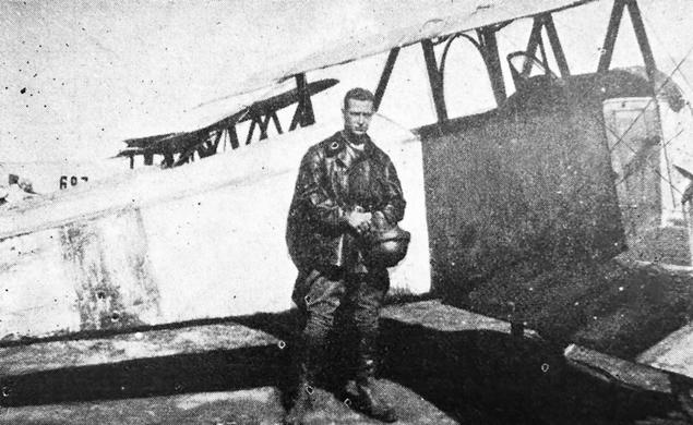 Hobey Baker as a Flight Commander in France stands by his plane. 