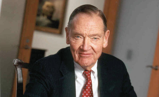 Image of John Bogle ’51 sitting at a desk