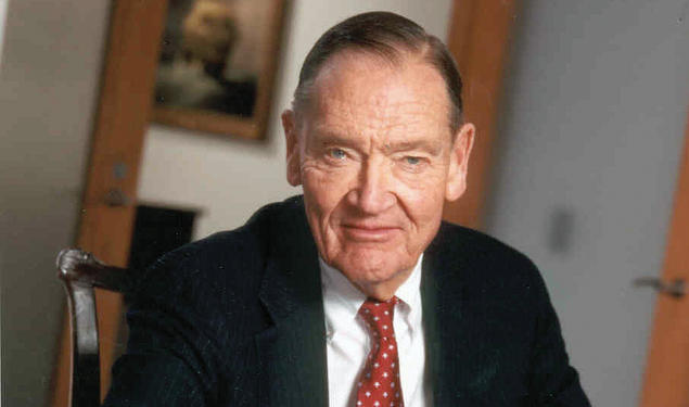 Image of John Bogle ’51 sitting at a desk