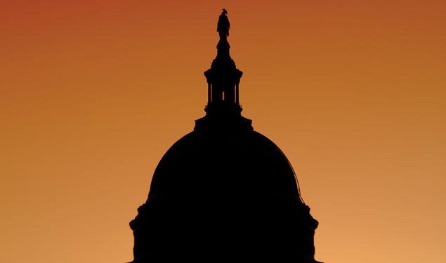 The U.S. Capitol building at sunset.
