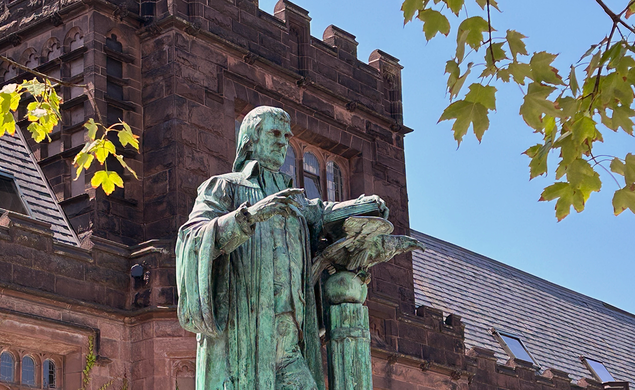 Statue of John Witherspoon with East Pyne Hall in the background