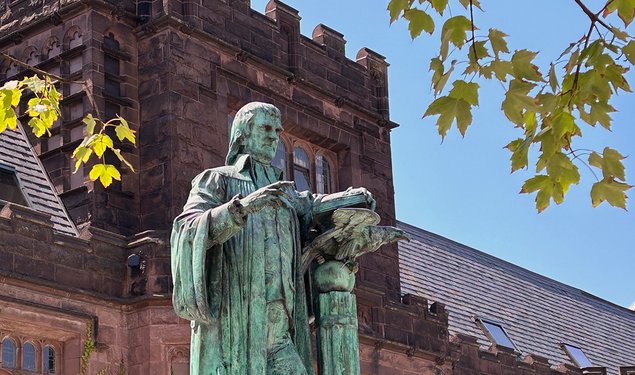 Statue of John Witherspoon with East Pyne Hall in the background